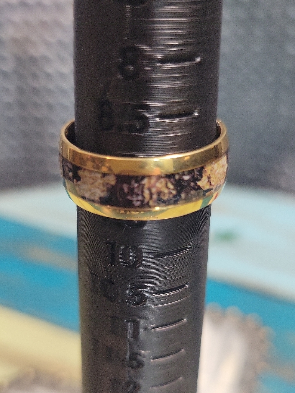 Gold Tone Ring with Black and Gold Inlay